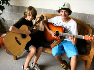 Teens playing guitar