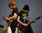 Teens playing guitar