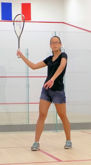 Girl playing squash